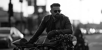 Motorcyclist in black and white